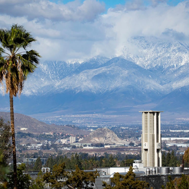 UCR view with Belltower and snowy mountains