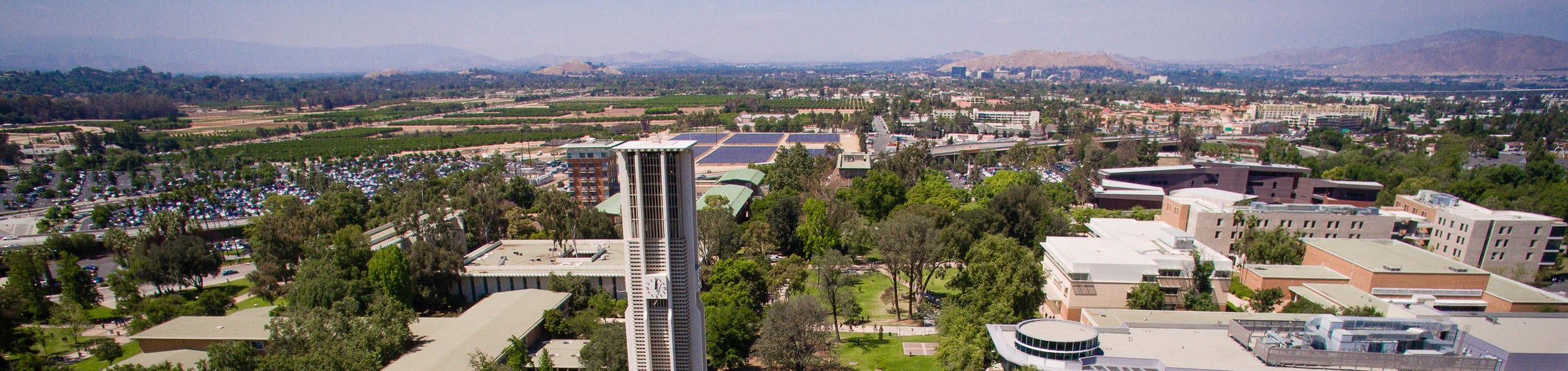 Aerial Image of UCR with the Belltower, hub and mountain-scape