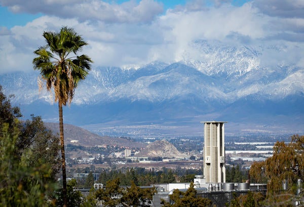 UCR view with Belltower and snowy mountains