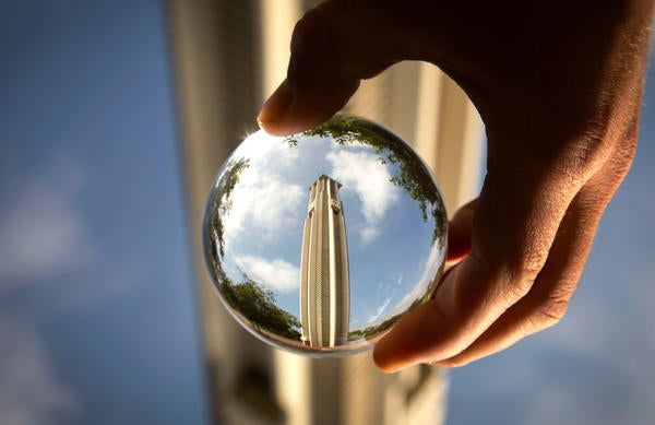 Belltower upside down, upside right through lens ball