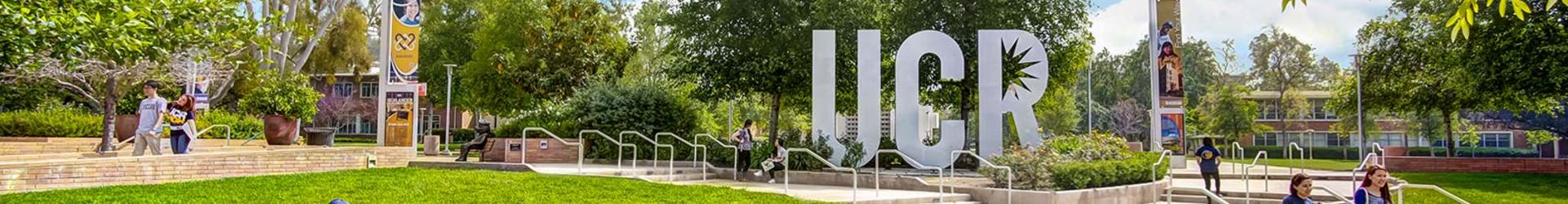 UCR Sign, green, and tower